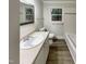 Clean bathroom featuring a tub, neutral vanity, and natural light at 1508 Hodge Rd, Knightdale, NC 27545
