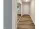 Hallway boasts beautiful flooring leading to other rooms, creating a seamless transition throughout the home at 1508 Hodge Rd, Knightdale, NC 27545