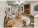 Bright living room with stone fireplace, plush seating, and neutral decor. Virtually staged at 1508 Hodge Rd, Knightdale, NC 27545