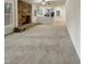 Open-concept living room with fireplace and seamless flow into the bright, white kitchen area at 1508 Hodge Rd, Knightdale, NC 27545