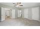 Spacious bedroom with ceiling fan, neutral paint, and multiple closets at 160 Deer Tracks Dr, Wendell, NC 27591