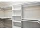 Walk-in closet with shelving and hanging rods at 160 Deer Tracks Dr, Wendell, NC 27591