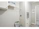 Functional utility room featuring shelving, modern hookups, and easy-to-clean flooring at 160 Deer Tracks Dr, Wendell, NC 27591