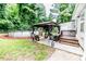 Backyard featuring an above-ground pool, patio area, and well-maintained lawn for outdoor enjoyment at 1605 Goldsboro Ave, Sanford, NC 27330