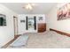 Comfortable bedroom featuring neutral walls, cozy bed, and natural light from the window at 1605 Goldsboro Ave, Sanford, NC 27330