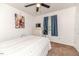 Bright bedroom with carpet, closet, and simple furnishings, providing a cozy and comfortable atmosphere at 1605 Goldsboro Ave, Sanford, NC 27330
