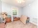 Bedroom featuring a window, carpeted floor, and ample space for storage, creating a cozy atmosphere at 1605 Goldsboro Ave, Sanford, NC 27330