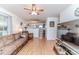Comfortable living room featuring hardwood floors and an open layout to the kitchen at 1605 Goldsboro Ave, Sanford, NC 27330