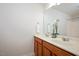 Bathroom featuring double sinks, a large mirror and modern fixtures at 1642 Holly Grove Way, Durham, NC 27713