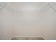Walk-in closet with built-in shelving for optimal organization and storage at 1642 Holly Grove Way, Durham, NC 27713