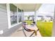 A cozy back porch offers a relaxing space with a hammock and serene views of the backyard at 1720 Pinecliff Ct, Fuquay Varina, NC 27526
