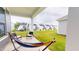 Enjoy the outdoors from this back porch, complete with a hammock and backyard views at 1720 Pinecliff Ct, Fuquay Varina, NC 27526