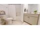 This is a clean bathroom with a shower-tub combo and modern vanity at 1720 Pinecliff Ct, Fuquay Varina, NC 27526