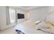 Bright bedroom features a large bed, dresser, and window, great for relaxing at 1720 Pinecliff Ct, Fuquay Varina, NC 27526