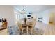 Bright and open dining area flowing into the living room, great for entertaining at 1720 Pinecliff Ct, Fuquay Varina, NC 27526