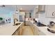 Well-equipped kitchen with a large island, modern appliances, and ample counter space at 1720 Pinecliff Ct, Fuquay Varina, NC 27526
