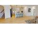 Modern kitchen island with seating for four, complemented by sleek countertops, stainless steel appliances, and stylish cabinetry at 1720 Pinecliff Ct, Fuquay Varina, NC 27526