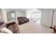 Cozy living area with plush leather seating, a relaxing hammock, and an abundance of natural light at 1720 Pinecliff Ct, Fuquay Varina, NC 27526