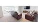 Comfortable living room features a cozy couch, TV, and hammock at 1720 Pinecliff Ct, Fuquay Varina, NC 27526