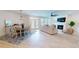 Bright living room boasts an open floor plan and fireplace, great for entertaining at 1720 Pinecliff Ct, Fuquay Varina, NC 27526