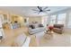 Bright and airy living room showcasing a modern design with comfortable furnishings and lots of natural light at 1720 Pinecliff Ct, Fuquay Varina, NC 27526