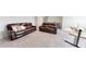 Comfortable living room features couches and a hammock at 1720 Pinecliff Ct, Fuquay Varina, NC 27526