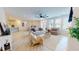 Open-concept living room featuring stylish decor, comfortable seating, and ample natural light at 1720 Pinecliff Ct, Fuquay Varina, NC 27526