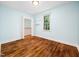 Inviting bedroom with beautiful hardwood floors and a bright window at 1825 Watkins St, Raleigh, NC 27604