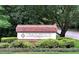 A beautifully landscaped entrance to Trailwood Heights neighborhood at 1851 Trailwood Heights Ln # 204, Raleigh, NC 27603