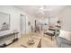 Open-concept living room and dining area with a view into the kitchen at 1851 Trailwood Heights Ln # 204, Raleigh, NC 27603