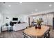 Spacious open-concept living room with dining area and kitchen, offering an inviting and airy atmosphere at 2010 Nebula Way, Durham, NC 27703