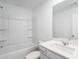 Bathroom with tub and shower combo and vanity with sink at 2019 Nebula Way, Durham, NC 27703
