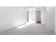 Bedroom with plush carpet and easy access to a large closet at 2019 Nebula Way, Durham, NC 27703