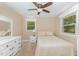A bedroom with hardwood floors, a double bed, and plenty of natural light at 2139 Race Track Rd, Burlington, NC 27215