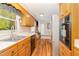 Functional kitchen featuring oak cabinets, stainless steel appliances, and an open layout at 2139 Race Track Rd, Burlington, NC 27215