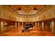 This music room is fully equipped with a grand piano, sound-engineered walls, and paneled ceiling at 2540 Seaforth Rd, Pittsboro, NC 27312