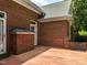 Backyard with brick and a concrete patio at 2819 Russell Mcpherson Rd, Burlington, NC 27215