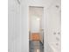 Hallway view of a bathroom featuring a shower, toilet and tile floors at 2819 Russell Mcpherson Rd, Burlington, NC 27215