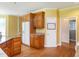 Bright eat-in kitchen boasts custom cabinets, granite countertops, and stainless steel appliances at 2819 Russell Mcpherson Rd, Burlington, NC 27215