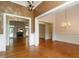 Open-concept living space with fireplace and hardwood floors at 2819 Russell Mcpherson Rd, Burlington, NC 27215