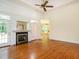 Cozy living room featuring a fireplace and direct access to an outdoor living space at 2819 Russell Mcpherson Rd, Burlington, NC 27215