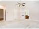 Carpeted main bedroom with ceiling fan and ensuite bathroom at 2819 Russell Mcpherson Rd, Burlington, NC 27215