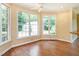 Bright sunroom filled with natural light offers a relaxing atmosphere and backyard views at 2819 Russell Mcpherson Rd, Burlington, NC 27215