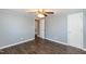 Bedroom featuring wood-look flooring, neutral paint, and a closet at 3013 Avery St, Raleigh, NC 27610