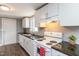 Stylish kitchen showcasing white cabinets and contemporary countertops at 3013 Avery St, Raleigh, NC 27610