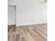 Spacious room with hardwood floors and white walls, perfect for any decor at 324 Longleaf Glen Court, Zebulon, NC 27597