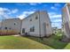 Back of house with grass and patio with privacy fence on property line at 3505 Triad Ct, Raleigh, NC 27604