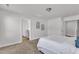 Spacious bedroom, carpeted, with open view to bathroom, showcasing a tranquil living space at 3505 Triad Ct, Raleigh, NC 27604