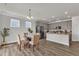 Dining area showcasing natural light and hardwood floors at 3505 Triad Ct, Raleigh, NC 27604