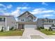 Charming two-story home featuring a two-car garage and manicured front lawn at 3505 Triad Ct, Raleigh, NC 27604